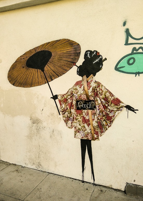 street art a silhouette of a woman wearing a kimono