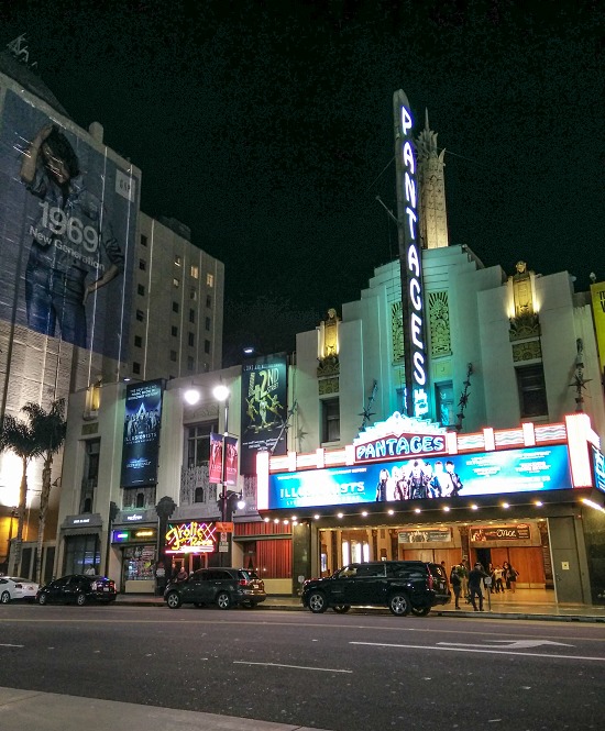 a lit up theatre front