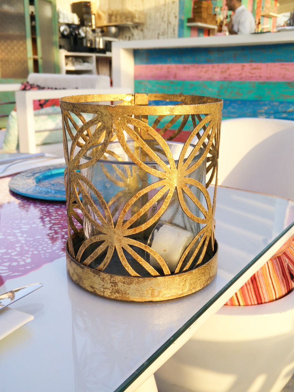Tarnished gold candle holder with cutout design