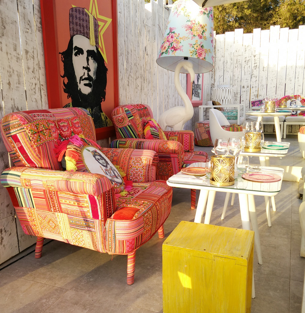 colourful patchwork chairs and bright table settings